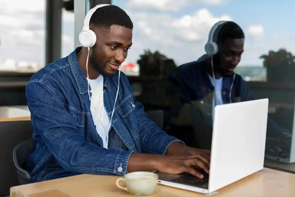 Students learning top computer courses like graphic design, video editing and programming